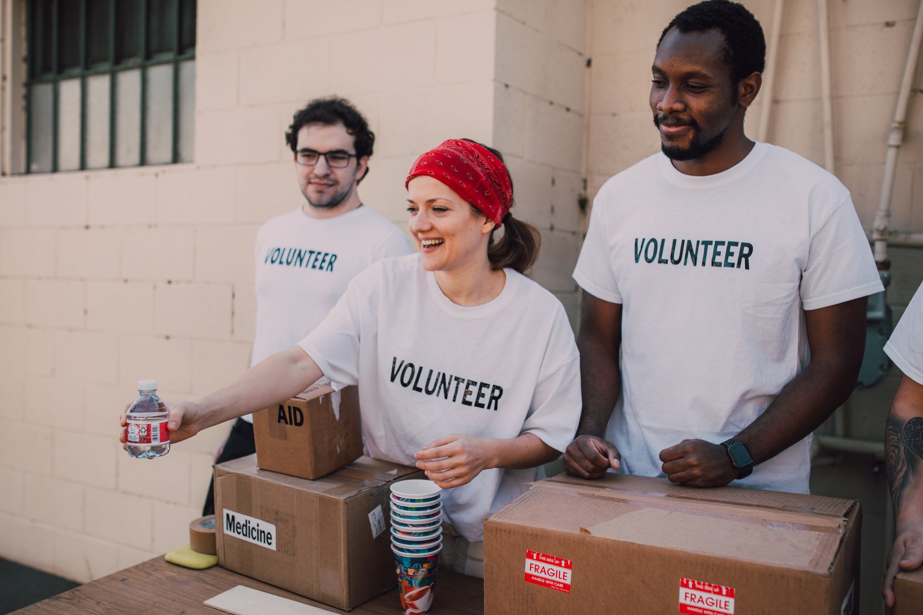 Volunteers from the neighbourhood smiling together
