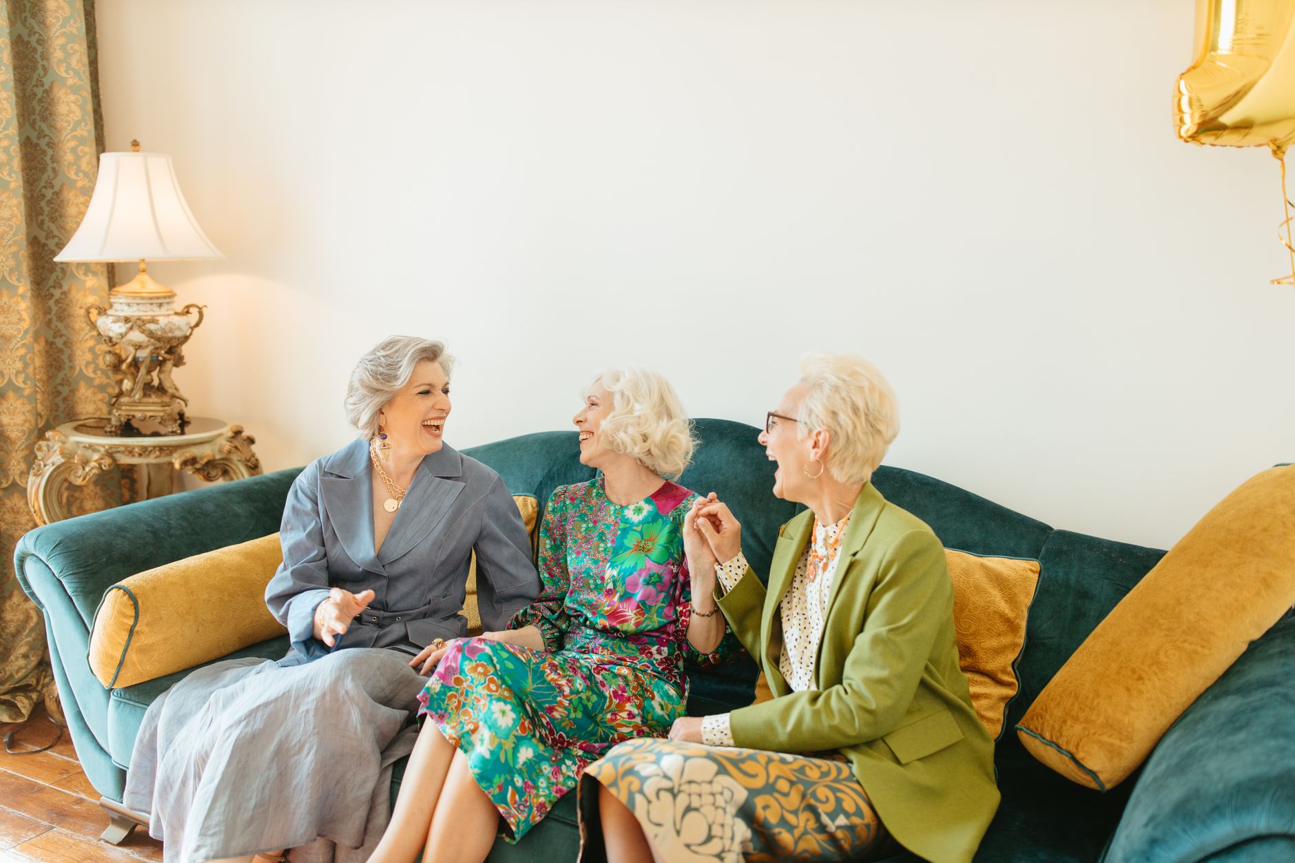 Older friends laughing together